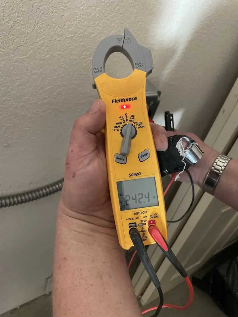 Voltage testing with clamp meter during Hot Tub / Pool Electrical Wiring in Eagle Point